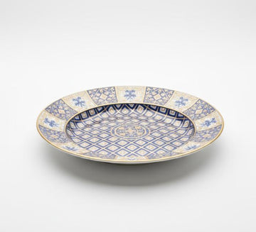 Dekorativ tallerken med geometrisk mønster