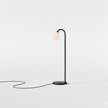 Minimalistisk bordlampe med rund skærm og metalfod